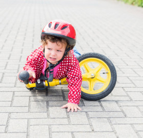 child falling off bike